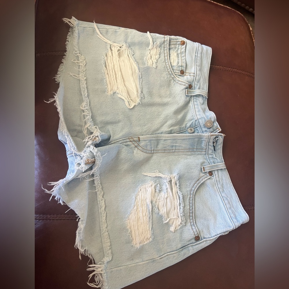 Levi’s 501 Distressed Light Blue Denim Shorts